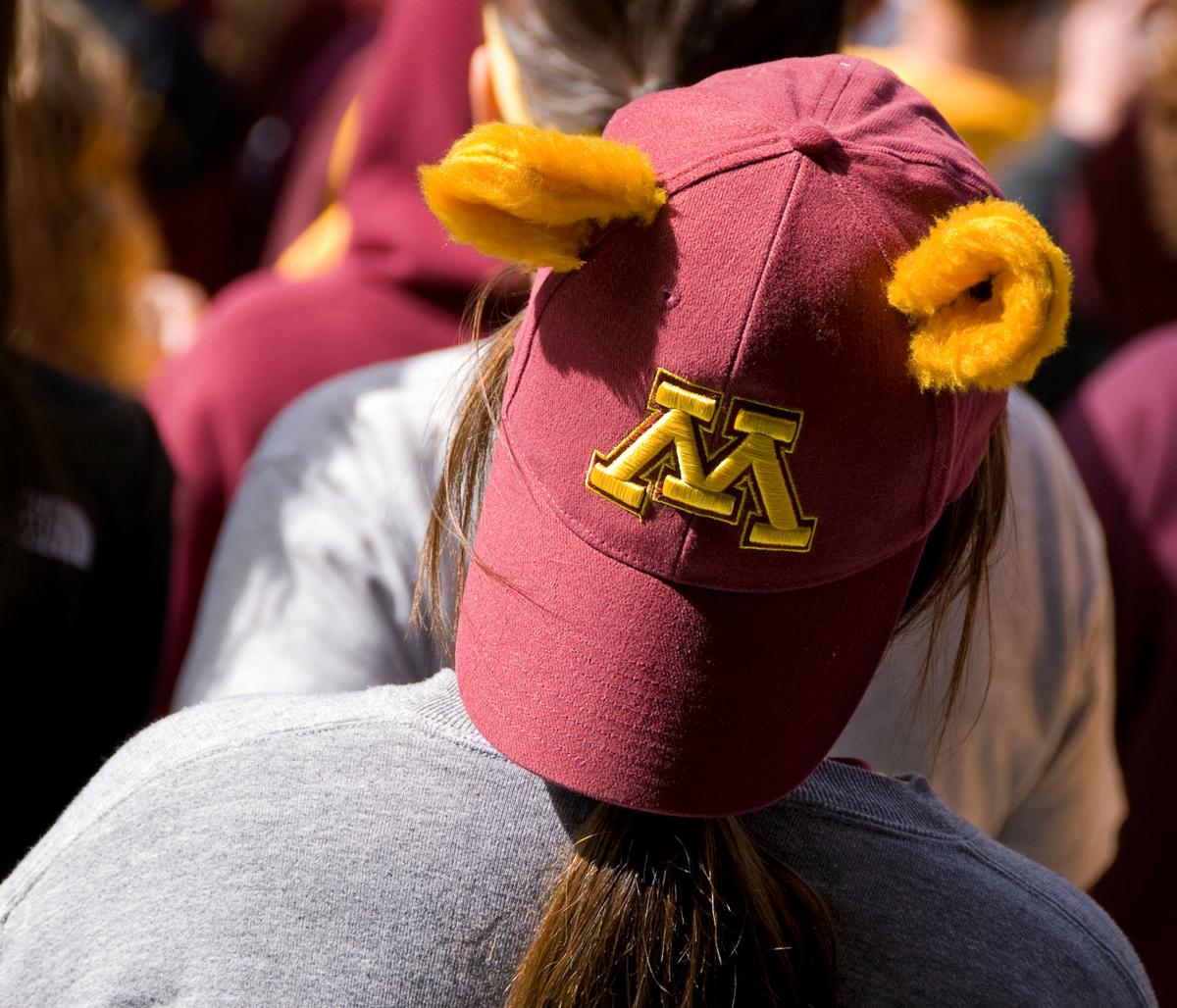 A student wearing a Block M hat with gopher ears