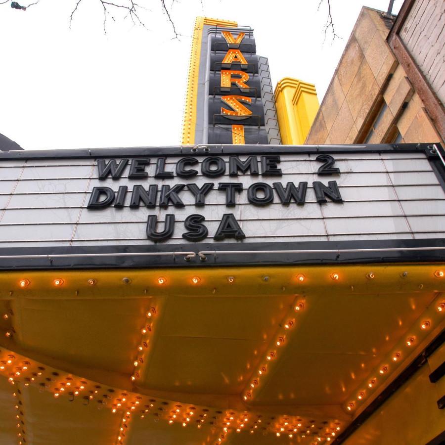 Varsity Theater with a sign that says Welcome 2 Dinkytown USA