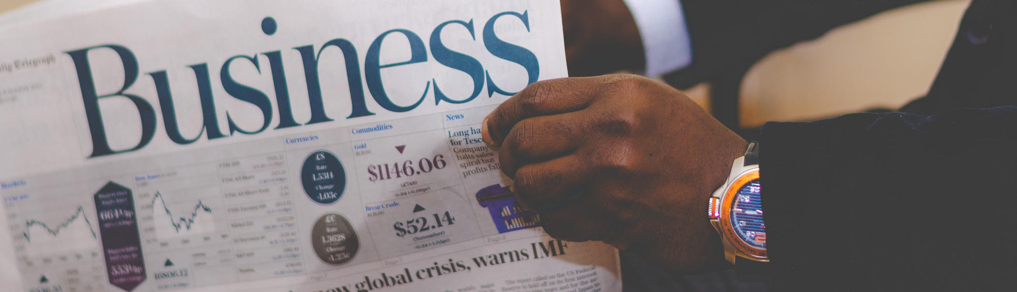 Stock photo of the business section of a newspaper