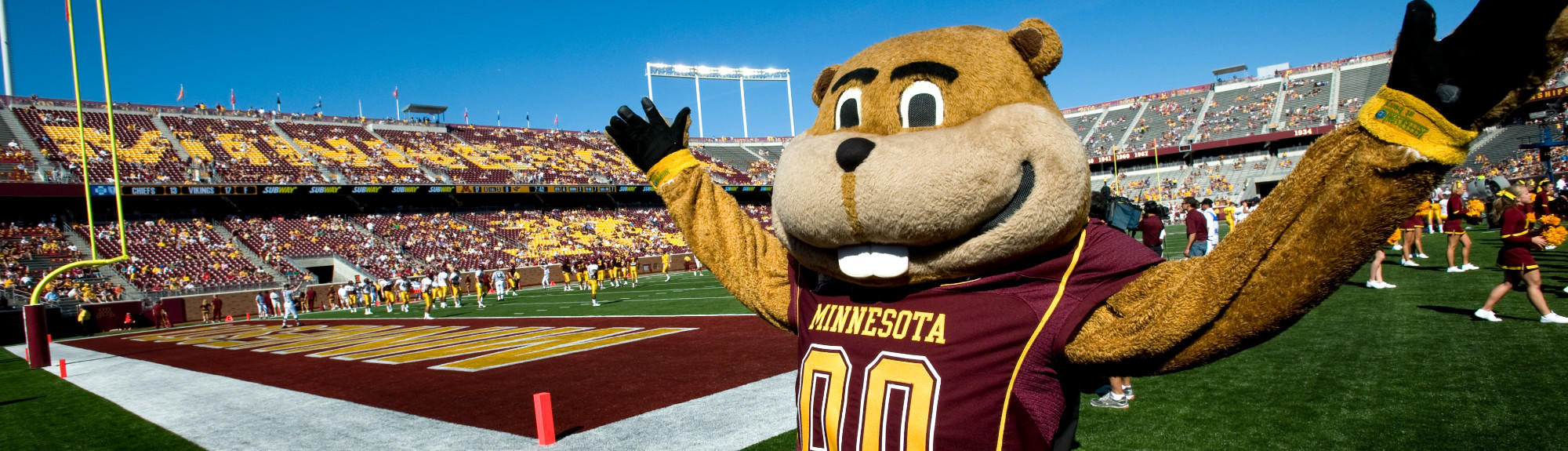 Goldy Gopher opens his arms wide on gameday