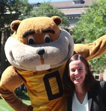 Director Keri Risic with Goldy Gopher